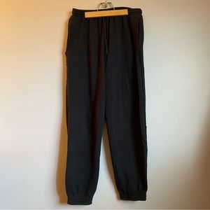 Aerie. Black joggers. Size large. Relaxed fit. Distressed fabric. Cuffed ankles.